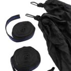 A black hammock with rolled straps and metal hooks. The straps have blue stitching and are neatly coiled next to the hammock fabric.