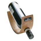A wine bottle balanced horizontally on a wooden holder, displaying a Subaru logo. The holders design creates a visual illusion of the bottle floating in the air. The bottle has a screw cap and a mostly blank label.