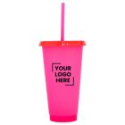 A pink reusable tumbler with a bright red lid and straw. The front of the tumbler features the text Your Logo Here in black, enclosed in a square bracket design.