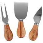 Three cheese knives with wooden handles arranged vertically. The set includes a fork-tipped knife, flat spatula-like knife, and a curved knife. The handles have Sevan Meat Market engraved on them.