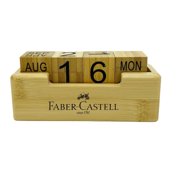 A wooden block calendar from Faber-Castell displaying AUG 16 MON with interchangeable blocks for day, month, and weekday. The brand and since 1761 are printed on the front of the holder.