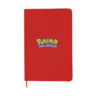 A red notebook featuring the Pokémon logo and the phrase Gotta catch em all! in blue and yellow text. An elastic band and ribbon bookmark are attached.