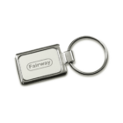 A rectangular metal keychain with a circular key ring. The keychain features a white insert with the word Fairway printed in gray inside an oval border. The metal frame and ring are silver-colored.