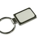 A rectangular metal keychain with a blank, reflective surface attached to a round keyring.