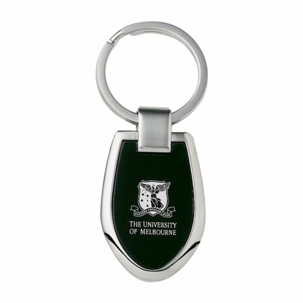 A sleek silver keyring with a black insert featuring the University of Melbourne logo, including a stylized bird and banner.