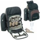 A black picnic backpack with one section open, showing stored cutlery, plates, glasses, and napkins. The front pocket is branded with SourceForge. Another backpack is shown closed, highlighting its design.