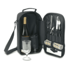 A portable picnic bag with a bottle of wine, two wine glasses, folded napkins, forks, knives, and a corkscrew. The bag has compartments for organizing items and a strap for easy carrying.