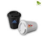 Two reusable coffee cups: one black with a blue logo and a black lid, and one white with a multicolored logo and a white lid. A CO₂ Neutral label is in the top right corner.