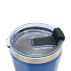 Close-up of a blue stainless steel travel mug with a clear plastic lid. The lid features a black sliding cover over the drinking spout. The mug has a smooth, matte finish and a silver rim around the lid.