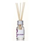A small clear glass bottle labeled Healthcare with a silver cap, containing several light wooden diffuser sticks. The bottle is partially filled with liquid, suggesting it is a fragrance or essential oil diffuser.