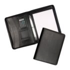 A black leather binder is open, revealing a built-in calculator, notepad, and organizational pockets on the left side. The right side features a closed view of the binder. The binder is designed for professional use.
