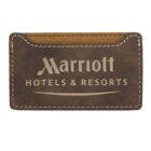 A brown, rectangular leather cardholder with white stitching displays the Marriott Hotels & Resorts logo in white text.
