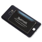 A smartphone with a dark, leather-like cardholder attached to the back. The cardholder is branded with the Marriott Hotels & Resorts logo in white text.