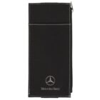 A black rectangular pouch with white stitching featuring the Mercedes-Benz logo and name at the bottom. The top has a flap with a silver snap closure.