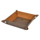 A square leather tray with raised edges and white metal snaps at the corners. The exterior is a dark brown, while the interior is a lighter brown. The stitching is visible along the edges.