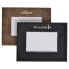 Two leather photo frames are shown: one brown with SeaLand at the top, and one black with Shopping4u. Both frames have stitching details and a plain white center where a photo can be placed.