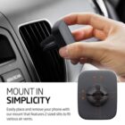 A hand is placing a phone mount into a cars air vent. The mount is black with prongs. Text reads: Mount in Simplicity. Easily place and remove your phone with our mount that features 2 sized slits to fit various air vents.