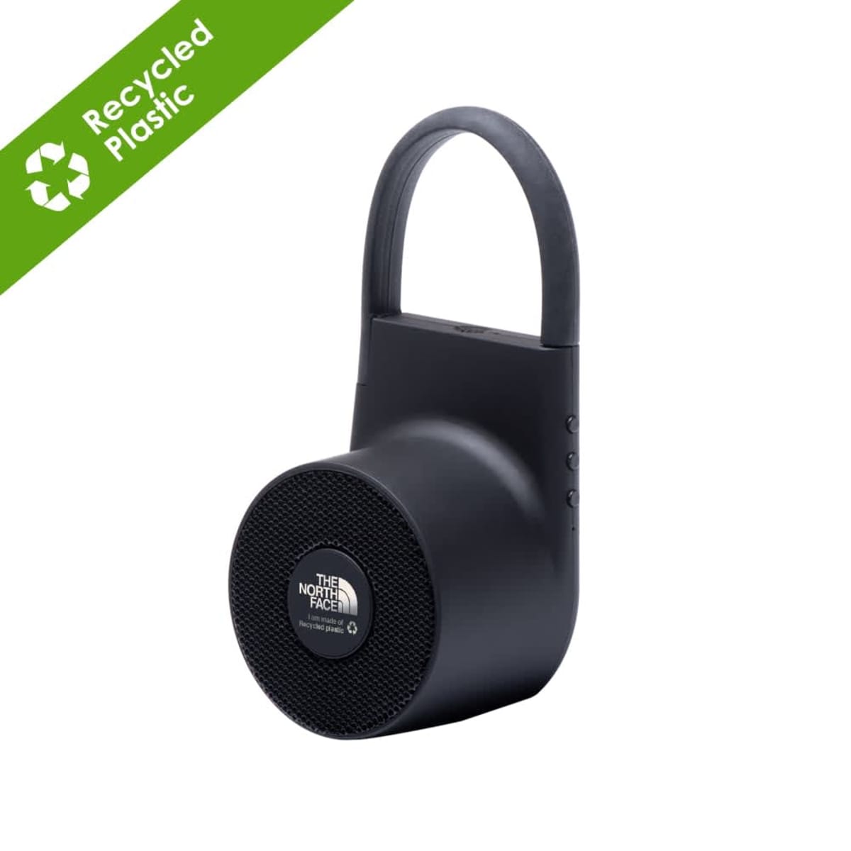 A black portable speaker with a unique padlock design, featuring the North Face logo on the front. It has a handle on top and buttons on the side. A green label in the corner reads Recycled Plastic.