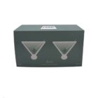 Green box featuring illustrations of two martini glasses. The box displays the word Aura and is labeled as a set of two iridescent martini glasses with a capacity of 285ml.