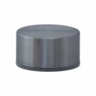 A round, silver metal lid with a smooth, brushed finish. The lid has a flat top and slightly curved edges, suggesting it fits onto a cylindrical container. The metallic surface reflects light.