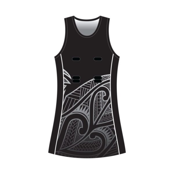 Black netball dress with silver Māori-inspired patterns on the lower sides and front.