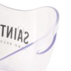 Close-up of a clear plastic container with the word SAINT partially visible in black text on the surface. The container has a smooth, curved design with an open side and soft shadows.