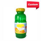 A green bottle with a yellow lid labeled Tea Mandarino featuring images of mandarins on the front. A red speech bubble in the top right corner reads Custom.