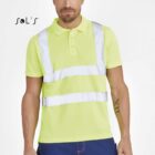 Man wearing a bright yellow safety shirt with reflective stripes and blue pants. He stands facing forward with one hand relaxed by his side. The background is plain white with a logo on the left side.