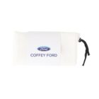 A white cloth is rolled up and secured with a white paper band featuring the Ford logo and the text Coffey Ford in blue. A black string is attached to the side.