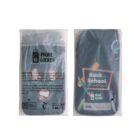 Two phone locker pouches with packaging. The left pouch shows a warning label and icons, while the right pouch features a Back to School design with colorful stationary illustrations. Both are biodegradable and made by Phone Locker.