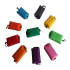 A circular arrangement of colorful portable bags with clips, featuring colors like blue, orange, black, yellow, green, red, purple, and pink, each laying flat with a visible clip on one end.