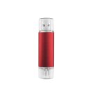 A red USB flash drive with transparent caps on both ends, standing upright against a white background.