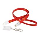 A red lanyard with McDonalds logos, featuring a detachable white USB charging cable with three types of connectors. Theres also a metal clip attached to a small white plastic holder.