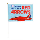 Illustration of a flag with a light blue background featuring a red jet labeled ROYAL AIR FORCE RED ARROWS in red and blue text. The jet has a red, white, and blue design, with RAF insignia.