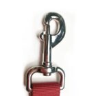 Close-up of a shiny, silver-colored metal swivel hook clasp attached to a red fabric strap. The hook has a spring-loaded gate for opening and closing. The background is plain white.