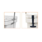Close-up image of a white cooler, showing two features: a sturdy metal handle on the left and a black rubber latch on the right, both designed for secure carrying and closure.