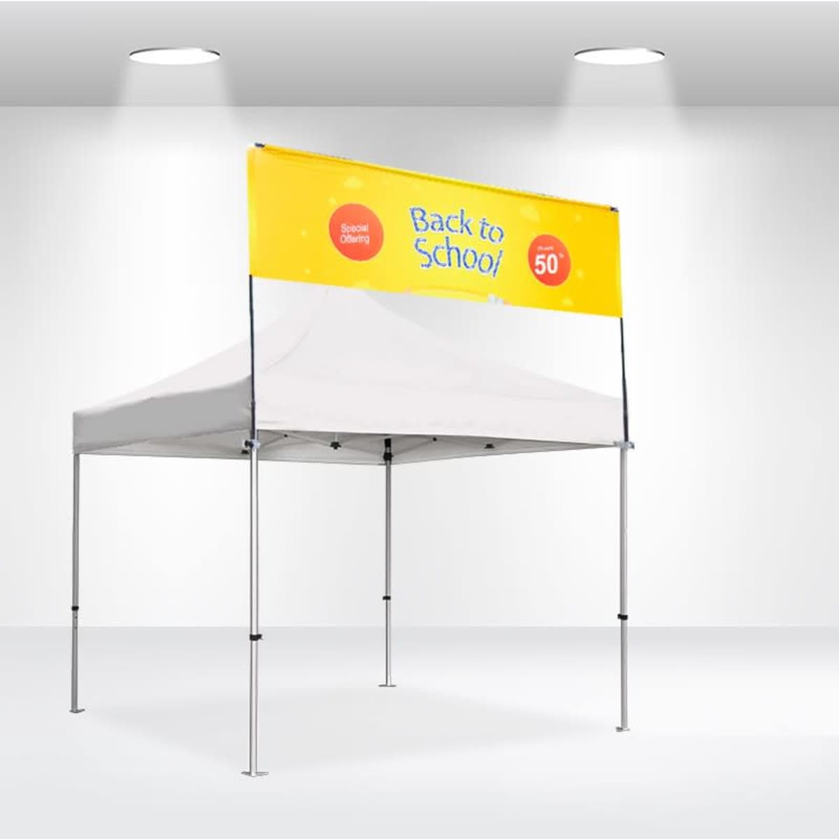 White canopy tent with a promotional banner on top that reads Back to School in yellow letters. The banner also displays Special Offering and 50 in red circles. The tent is set in a bright, spotlighted area.