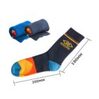 A single black sock with colorful patterns, orange heel and toe, and blue accents is displayed, measuring 200mm by 190mm. Brand is printed on the leg. Two rolled pairs of socks in blue and gray are in the background.