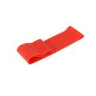 A flat, red resistance band is coiled in a simple loop. The band is laid out on a plain white background, showing its smooth, flexible material and vibrant color.