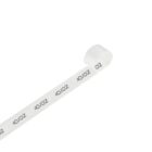 A white ribbon with the black text ZC printed repeatedly along its length is coiled slightly at the top on a white background.