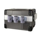A portable refrigerator with a rugged, metallic exterior. It features a branded panel with three cylindrical holders.
