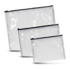 Three transparent zippered pouches of varying sizes, arranged from largest to smallest. Each has a dark zipper closure. The pouches are empty and have a glossy finish, reflecting light.