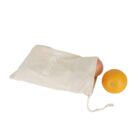 A beige cloth bag with a drawstring partially holds an orange, with another orange resting outside on a plain white background. The word Victoria is printed on the bag.