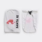 Two white fabric covers are shown. The left one displays a red silhouette of a lizard and the text SANTA FE vertically beside it. The right one is open, showing a black drawstring closure at the top.