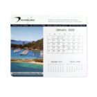 A calendar page for January 2025, featuring a scenic photo of Hamilton Island in the Whitsundays, QLD. It includes contact information for a business at the top, with December 2024 and February 2025 calendars partially visible.