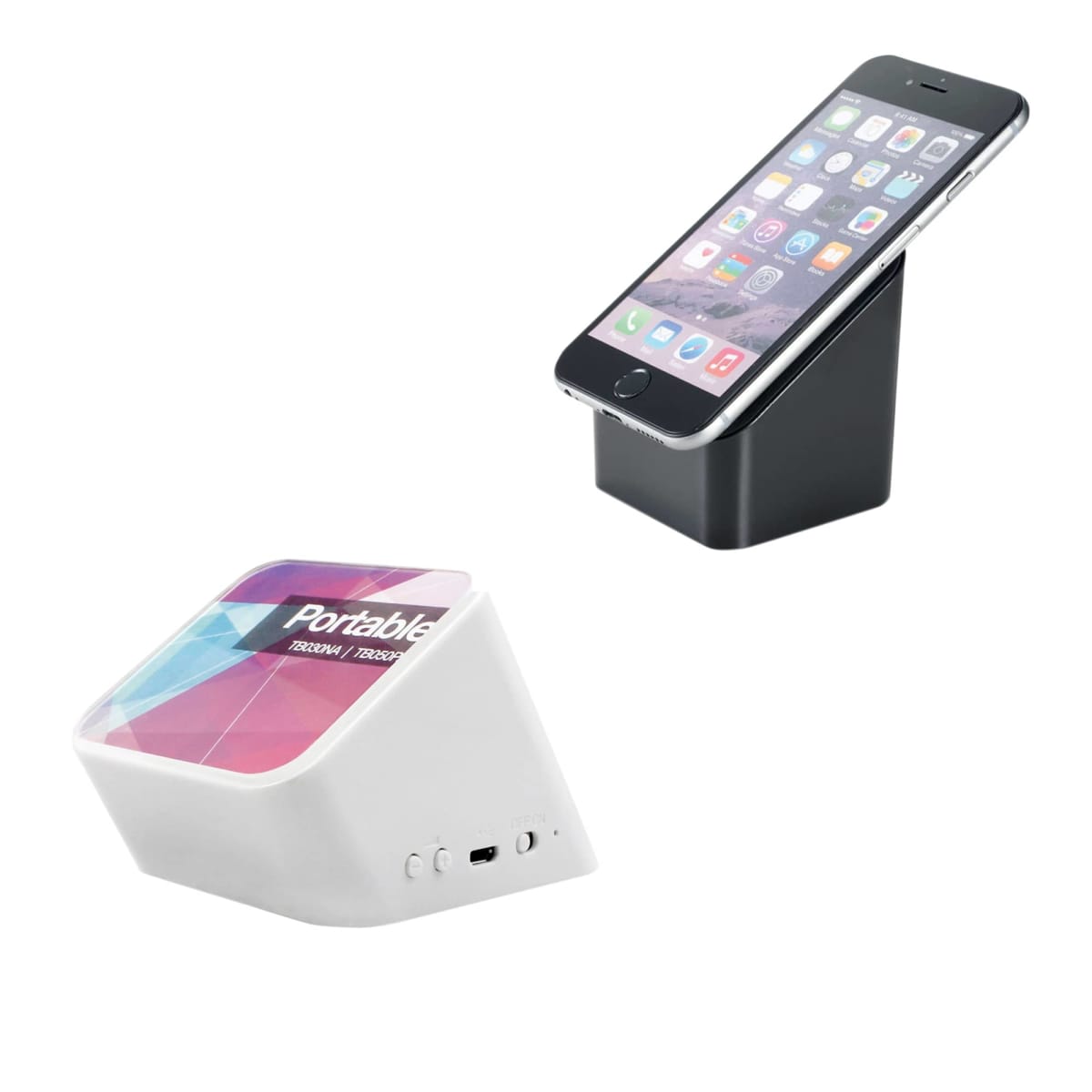 A smartphone on a black stand and a white speaker dock are displayed. The phone screen shows app icons, while the speaker has buttons and ports visible on the side. The speaker shows the text Portable with a geometric design.