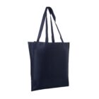 A dark blue, plain tote bag with two long handles is shown against a white background. The bag appears to be made of fabric and is empty, with its sides slightly folded inwards.