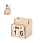 Wooden box-shaped desk organizer with a perpetual calendar displaying July 16. The top section holds pens, visible in a smaller version of the image.