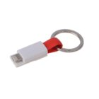 A red keychain with a USB cable attachment. The cable has a white connector at one end and loops through a silver keyring.