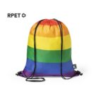 A drawstring backpack featuring rainbow stripes symbolizing LGBTQ+ pride. The material is labeled as recycled (RPET). Black drawstrings are attached for closure and shoulder straps.